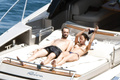 Sophie Marceau - topless sunbath on yacht (7/2016)