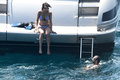 Sophie Marceau - topless sunbath on yacht (7/2016)