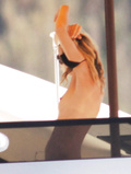 Heidi Klum topless on a yacht (08/2008)