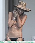Heidi Klum topless in St. Bart's (January 2015)