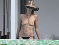 Heidi Klum topless in St. Bart's (January 2015)