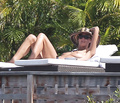 Heidi Klum topless in St. Bart's (January 2015)