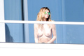 Heidi Klum topless in Miami (01/07/2017)