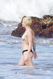 Miley Cyrus topless on Hawaii (01/2015)