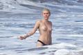 Miley Cyrus topless on Hawaii (01/2015)