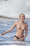 Miley Cyrus topless on Hawaii (01/2015)