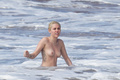 Miley Cyrus topless on Hawaii (01/2015)