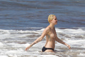 Miley Cyrus topless on Hawaii (01/2015)