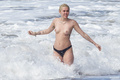 Miley Cyrus topless on Hawaii (01/2015)