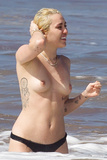 Miley Cyrus topless on Hawaii (01/2015)