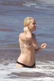 Miley Cyrus topless on Hawaii (01/2015)