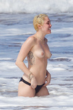Miley Cyrus topless on Hawaii (01/2015)