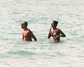 Melanie Brown topless on beach