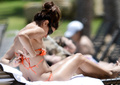 Eva Longoria topless sunbathing (2013)