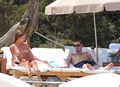 Millie Mackintosh topless on the beach (Ibiza, 8/2014)