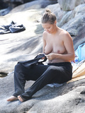 Lara Bingle topless sunbathung on beach (Sydney, 2011)