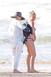 Lara Bingle topless on set (4/2011)