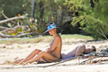 Lara Bingle sunbathing topless in Hawaii (8/2014), p. 1