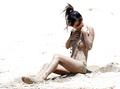 Bai Ling - sunbathing topless in Hawaii (may 2008)