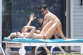 Joanna Krupa - sunbathing topless, Miami (May 2013)