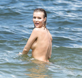 Joanna Krupa - sunbathing topless in Miami (6/2015)