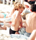 Kylie Minogue - sunbathing topless (11/1998)