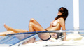 Cindy Crawford - sunbathing topless in Sardinia(8/2008)