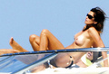 Cindy Crawford - sunbathing topless in Sardinia(8/2008)