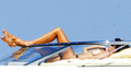 Cindy Crawford - sunbathing topless in Sardinia(8/2008)