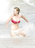 Kirsten Dunst - bikini slip in St. Bart’s (1/2005)