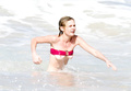 Kirsten Dunst - bikini slip in St. Bart’s (1/2005)