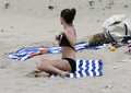 Kelly Brook sunbathing topless in St. Bart’s (1/2008)