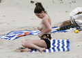 Kelly Brook sunbathing topless in St. Bart’s (1/2008)