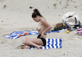 Kelly Brook sunbathing topless in St. Bart’s (1/2008)