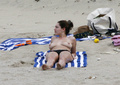Kelly Brook sunbathing topless in St. Bart’s (1/2008)