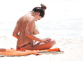 Kelly Brook topless sunbathing in Cancun (6/2013)