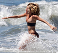 Sienna Miller - topless on the beach (4/2008)