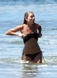 Sienna Miller - topless on the beach (4/2008)