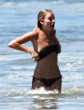 Sienna Miller - topless on the beach (4/2008)