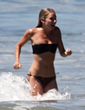 Sienna Miller - topless on the beach (4/2008)