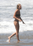 Sienna Miller - topless on the beach (4/2008)