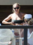 Sienna Miller - topless on the beach (4/2008)