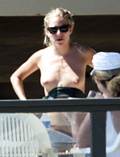 Sienna Miller - topless on the beach (4/2008)