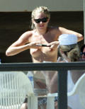 Sienna Miller - topless on the beach (4/2008)