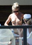Sienna Miller - topless on the beach (4/2008)