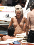 Sienna Miller - topless on yacht (7/2008)