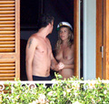Sienna Miller - topless on balcony (7/2008)