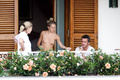 Sienna Miller - topless on balcony (7/2008)