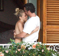 Sienna Miller - topless on balcony (7/2008)
