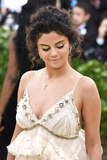 Selena Gomez busting out her huge cleavage